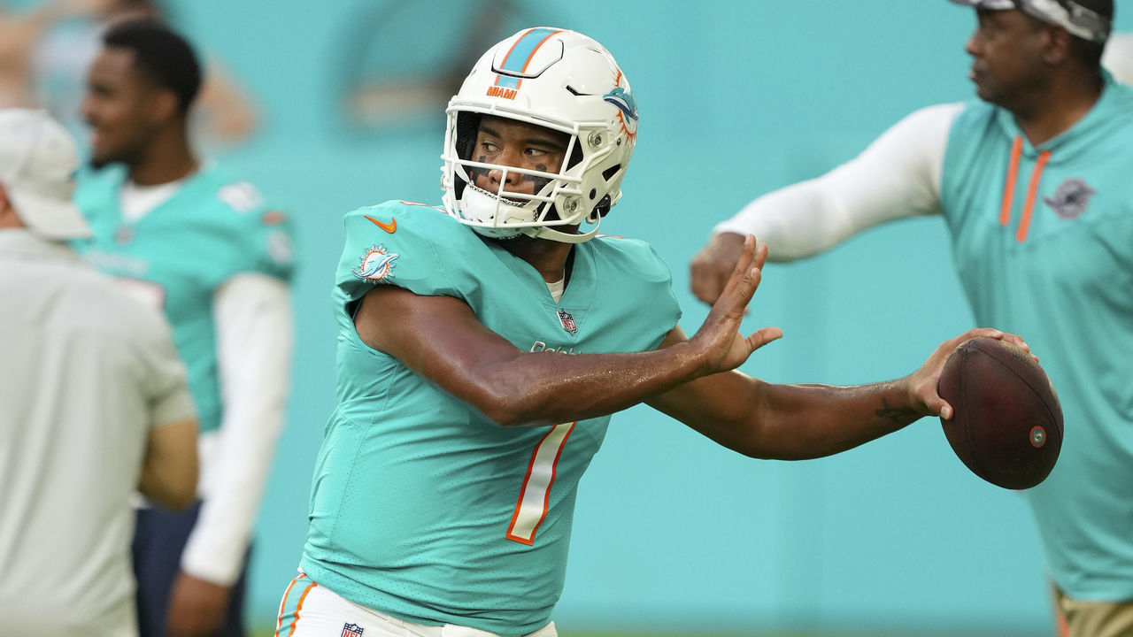 MIAMI GARDENS, FLORIDA - AUGUST 27: Tua Tagovailoa #1 of the Miami Dolphins warms up before the preseason game against the Philadelphia Eagles at Hard Rock Stadium on August 27, 2022 in Miami Gardens, Florida.