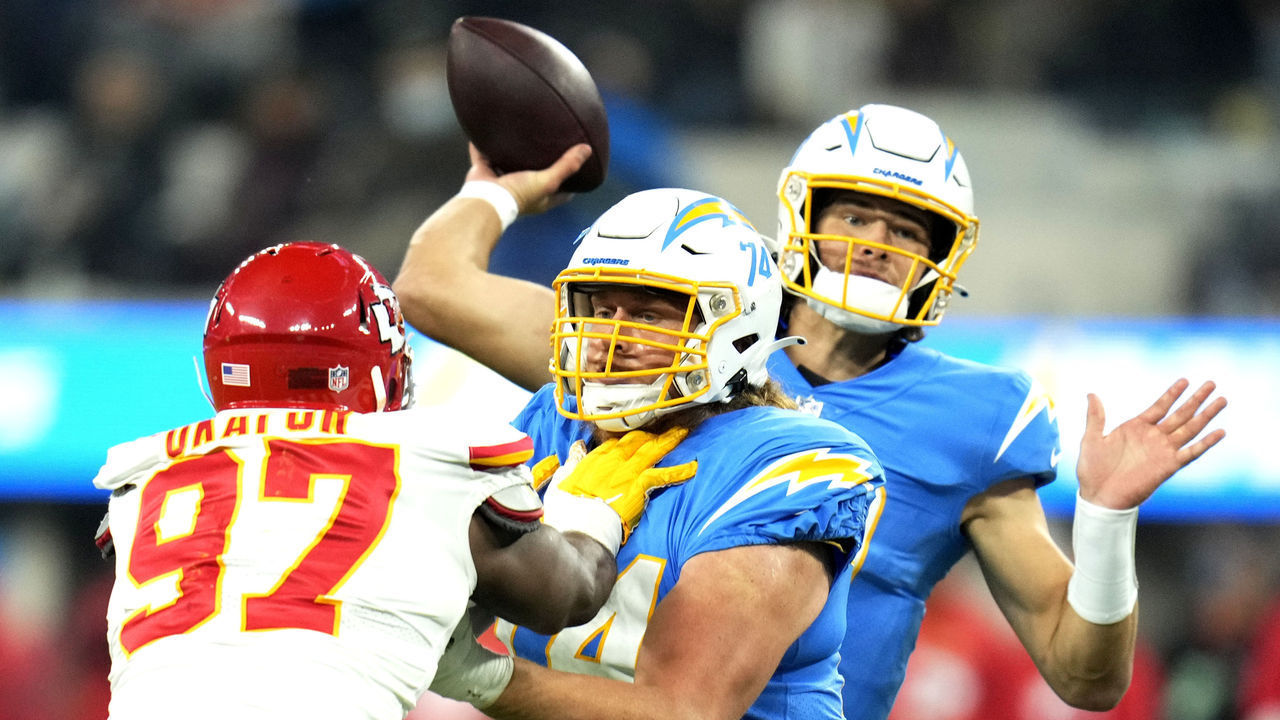 Inglewood, CA - December 16: Quarterback Justin Herbert #10 of the Los Angeles Chargers passes against the Kansas City Chiefs in the second half of a NFL football game at SoFi Stadium in Inglewood in Inglewood on Thursday, December 16, 2021.