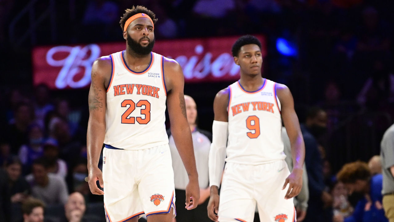 NEW YORK, NEW YORK - OCTOBER 15: Mitchell Robinson #23 and RJ Barrett #9 of the New York Knicks looks on against the Washington Wizards during a preseason game at Madison Square Garden on October 15, 2021 in New York City.