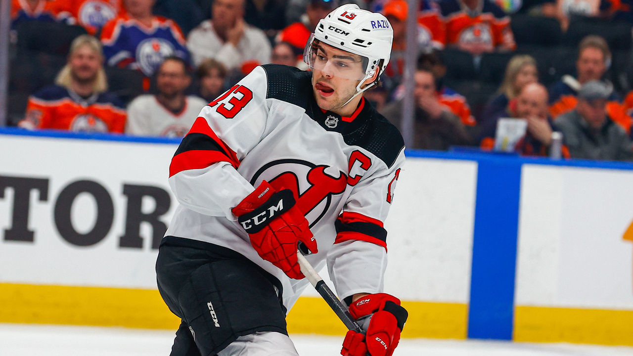 EDMONTON, AB - MARCH 19: New Jersey Devils Center Nico Hischier (13) looks for a pass in the first period during the Edmonton Oilers game versus the New Jersy Devils on March 19, 2022 at Rogers Place in Edmonton, AB.