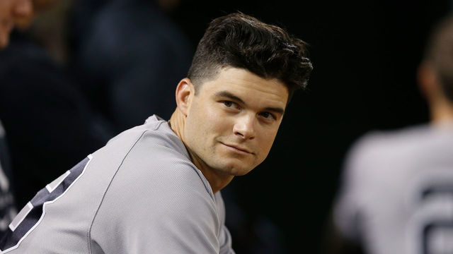 OAKLAND, CALIFORNIA - AUGUST 26: Andrew Benintendi #18 of the New York Yankees looks on from the dugout during the game against the Oakland Athletics at RingCentral Coliseum on August 26, 2022 in Oakland, California.