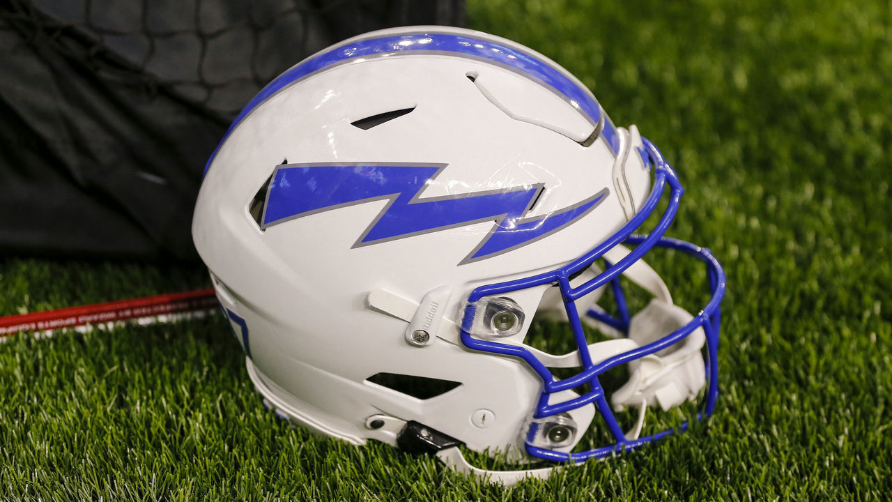 ARLINGTON, TX - NOVEMBER 06: An Air Force Falcons helmet sits on the turf during the Lockheed Martin Commanders Classic between the Army Black Knights and the Air Force Falcons on November 6, 2021 at Globe Life Field in Arlington, Texas.