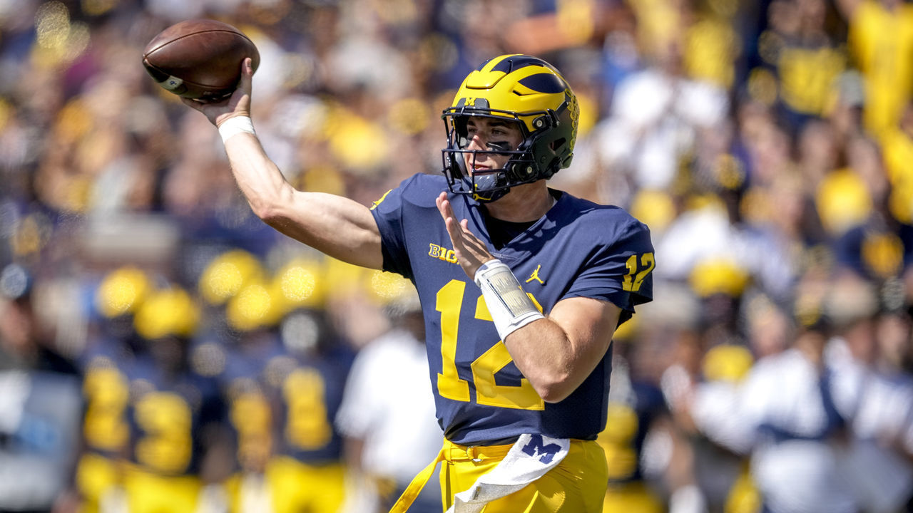 ANN ARBOR, MICHIGAN - SEPTEMBER 03: Cade McNamara #12 of the Michigan Wolverines throws a pass against the Colorado State Rams during the first half at Michigan Stadium on September 03, 2022 in Ann Arbor, Michigan.