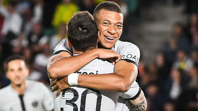 NANTES, FRANCE - SEPTEMBER 03: Kylian MBAPPE of PSG with Lionel (Leo) MESSI of PSG celebrates after scoring his team's second goal during the Ligue 1 match between FC Nantes and Paris Saint-Germain at Stade de la Beaujoire on September 3, 2022 in Nantes, France.