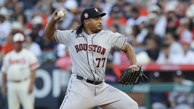 ANAHEIM, CALIFORNIA - SEPTEMBER 03: Luis Garcia #77 of the Houston Astros pitches in the first inning against the Los Angeles Angels at Angel Stadium of Anaheim on September 03, 2022 in Anaheim, California.
