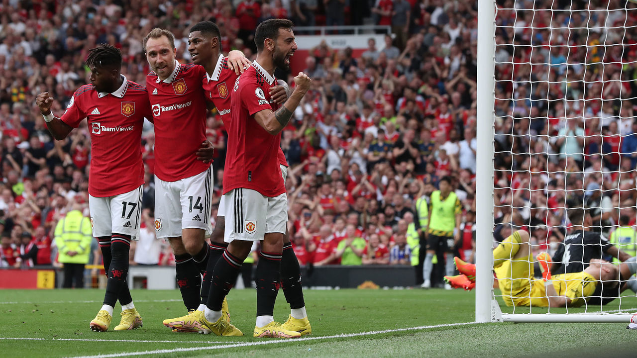 MANCHESTER, ENGLAND - SEPTEMBER 04: Marcus Rashford of Manchester United celebrates scoring their third goal during the Premier League match between Manchester United and Arsenal FC at Old Trafford on September 04, 2022 in Manchester, England.