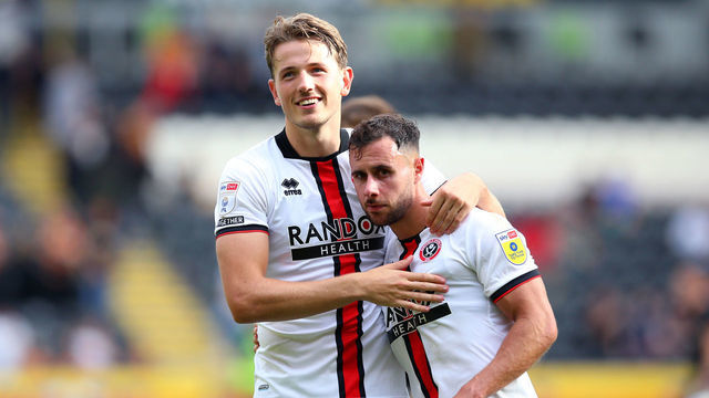 Sheffield United's Sander Berge (left) and George Baldock at the end of the Sky Bet Championship match at the MKM Stadium, Hull. Picture date: Sunday September 4, 2022.