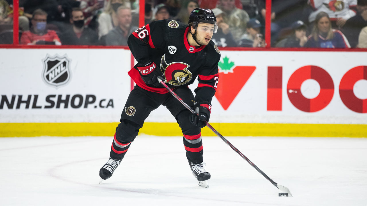 OTTAWA, ON - APRIL 10: Ottawa Senators Defenceman Erik Brannstrom (26) skates with the puck during second period National Hockey League action between the Winnipeg Jets and Ottawa Senators on April 10, 2022, at Canadian Tire Centre in Ottawa, ON, Canada.