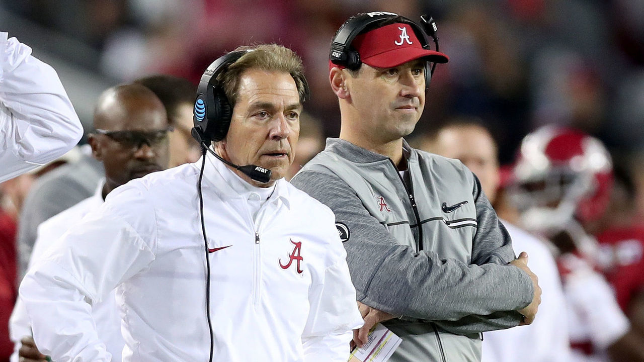 TAMPA, FL - JANUARY 09: Head coach Nick Saban (L) and offensive coordinator Steve Sarkisian of the Alabama Crimson Tide stand on the sideline during the second half of the 2017 College Football Playoff National Championship Game against the Clemson Tigers at Raymond James Stadium on January 9, 2017 in Tampa, Florida.