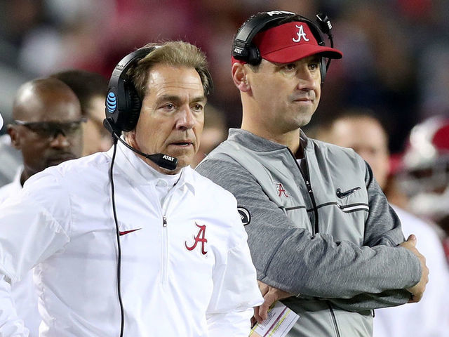 TAMPA, FL - JANUARY 09: Head coach Nick Saban (L) and offensive coordinator Steve Sarkisian of the Alabama Crimson Tide stand on the sideline during the second half of the 2017 College Football Playoff National Championship Game against the Clemson Tigers at Raymond James Stadium on January 9, 2017 in Tampa, Florida.