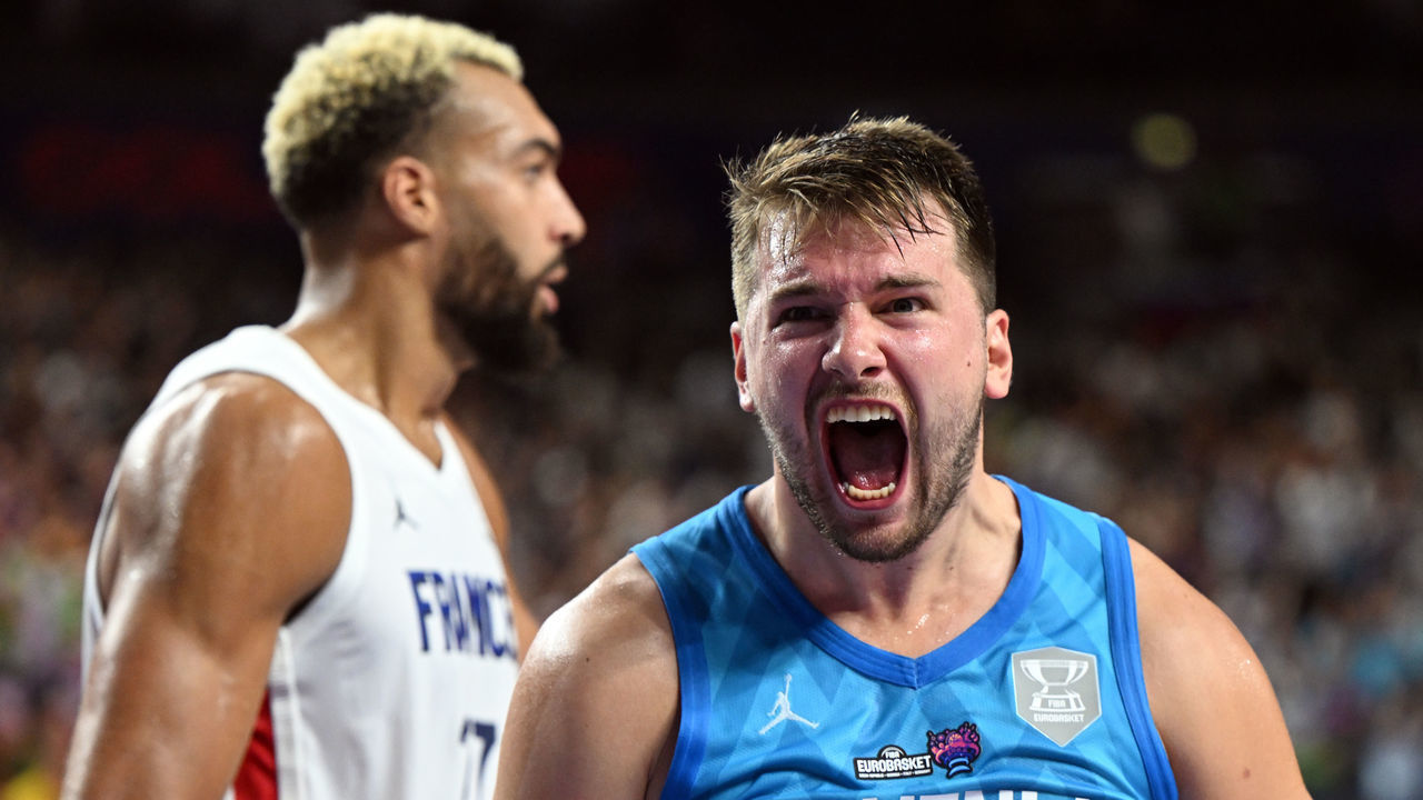 07 September 2022, North Rhine-Westphalia, Cologne: Basketball: European Championship, France - Slovenia, preliminary round, Group B, Matchday 5, Lanxess Arena. Slovenia's Luka Doncic celebrates a point. Photo: Federico Gambarini/dpa