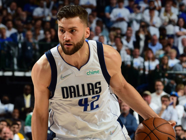 DALLAS, TX - MAY 24: Maxi Kleber #42 of the Dallas Mavericks drives to the basket against the Golden State Warriors during Game 4 of the 2022 NBA Playoffs Western Conference Finals on May 24, 2022 at the American Airlines Center in Dallas, Texas. Mandatory Copyright Notice: Copyright 2022 NBAE