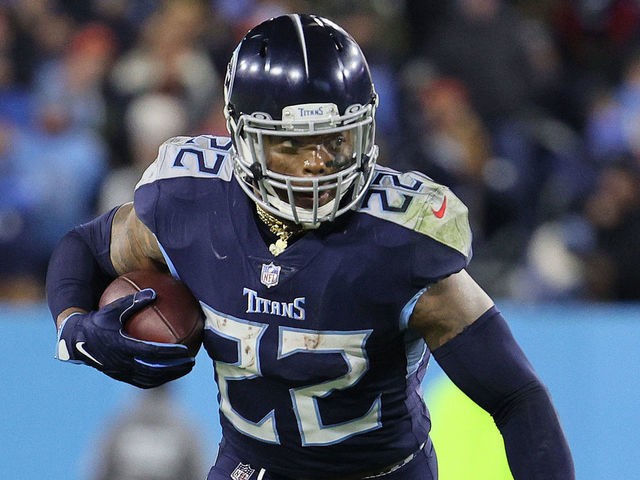 NASHVILLE, TENNESSEE - JANUARY 22: Derrick Henry #22 of the Tennessee Titans runs against the Cincinnati Bengals during the AFC Divisional Playoff at Nissan Stadium on January 22, 2022 in Nashville, Tennessee.