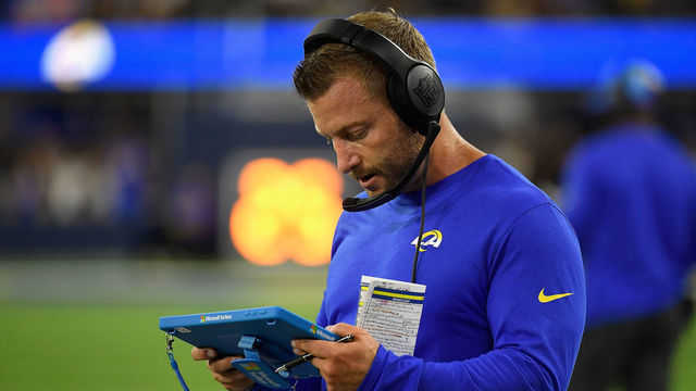 INGLEWOOD, CALIFORNIA - SEPTEMBER 08: Head coach Sean McVay of the Los Angeles Rams looks at a Microsoft Surface tablet during the second quarter of the NFL game against the Buffalo Bills at SoFi Stadium on September 08, 2022 in Inglewood, California.