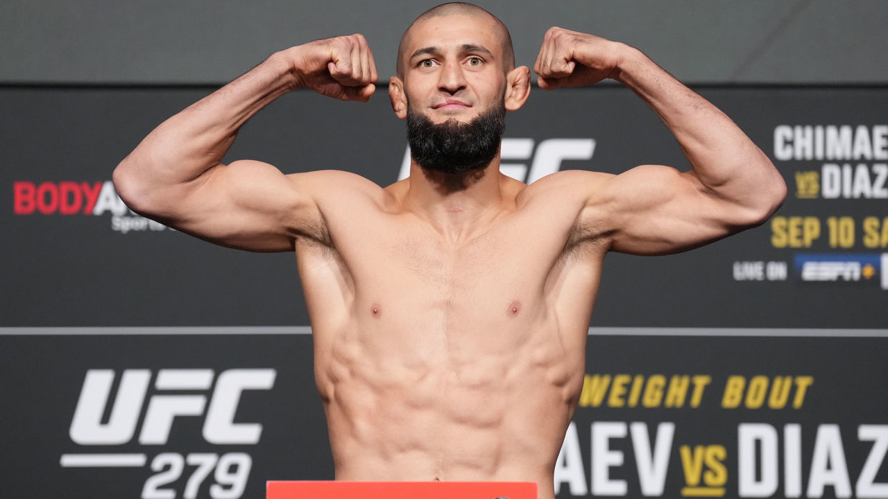 LAS VEGAS, NEVADA - SEPTEMBER 09: Khamzat Chimaev of Russia poses on the scale during the UFC 279 official weigh-in at UFC APEX on September 09, 2022 in Las Vegas, Nevada.