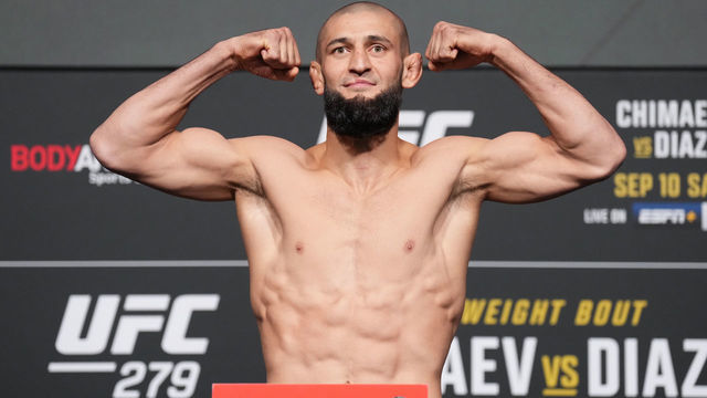 LAS VEGAS, NEVADA - SEPTEMBER 09: Khamzat Chimaev of Russia poses on the scale during the UFC 279 official weigh-in at UFC APEX on September 09, 2022 in Las Vegas, Nevada.