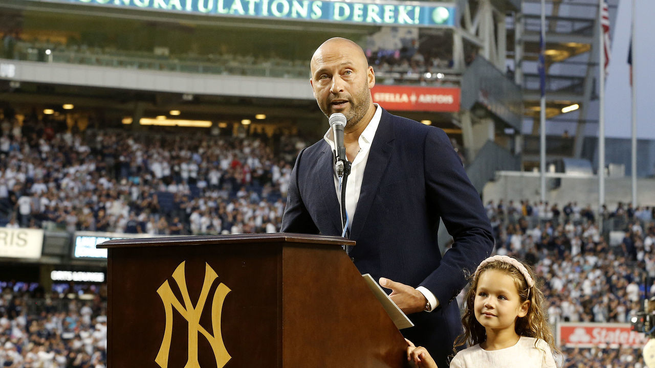 NEW YORK, NEW YORK - SEPTEMBER 09: Baseball Hall of famer Derek Jeter speaks to the fans alongside his daughter Bella as he is honored by the New York Yankees before a game against the Tampa Bay Rays at Yankee Stadium on September 09, 2022 in the Bronx borough of New York City.