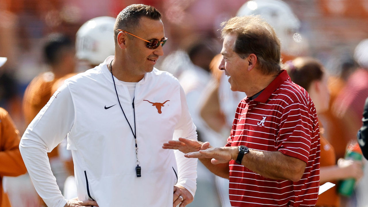 AUSTIN, TEXAS - SEPTEMBER 10: Head coach Steve Sarkisian of the Texas Longhorns talks with head coach Nick Saban of the Alabama Crimson Tide before the game at Darrell K Royal-Texas Memorial Stadium on September 10, 2022 in Austin, Texas.