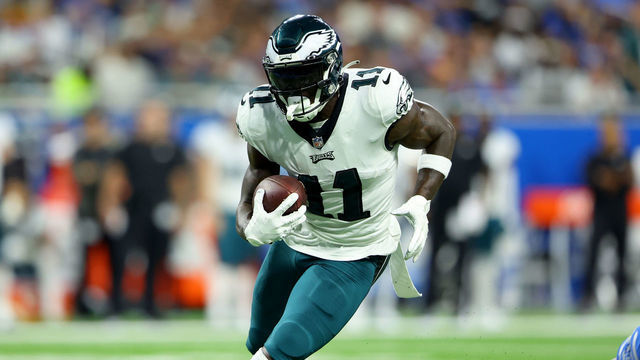 DETROIT, MICHIGAN - SEPTEMBER 11: A.J. Brown #11 of the Philadelphia Eagles runs with the ball during the first half against the Detroit Lions at Ford Field on September 11, 2022 in Detroit, Michigan.