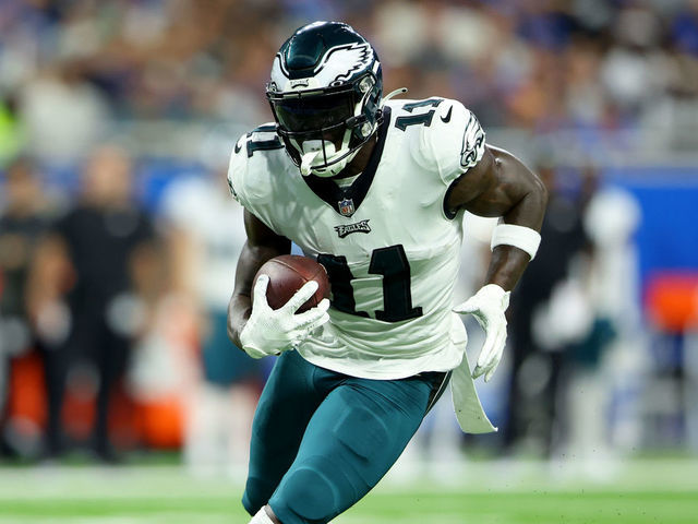 DETROIT, MICHIGAN - SEPTEMBER 11: A.J. Brown #11 of the Philadelphia Eagles runs with the ball during the first half against the Detroit Lions at Ford Field on September 11, 2022 in Detroit, Michigan.