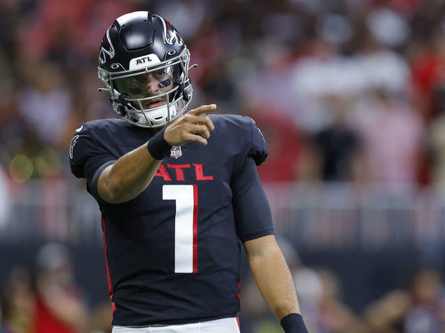 ATLANTA, GEORGIA - SEPTEMBER 11: Quarterback Marcus Mariota #1 of the Atlanta Falcons points during the first half against the New Orleans Saints at Mercedes-Benz Stadium on September 11, 2022 in Atlanta, Georgia.