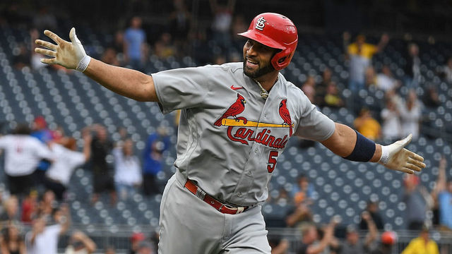 PITTSBURGH, PA - SEPTEMBER 11: Albert Pujols #5 of the St. Louis Cardinals reacts as he rounds the bases after hitting a two-run home run in the ninth inning during the game against the Pittsburgh Pirates at PNC Park on September 11, 2022 in Pittsburgh, Pennsylvania. The home run was the 697th of Pujols career, moving him to 4th place all time in MLB home runs.