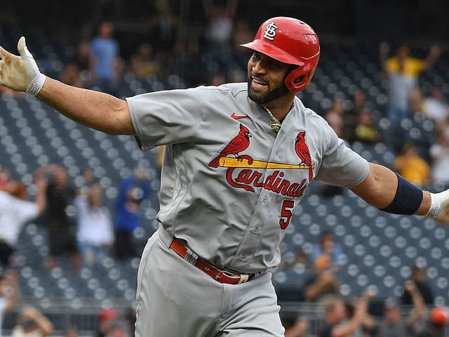 PITTSBURGH, PA - SEPTEMBER 11: Albert Pujols #5 of the St. Louis Cardinals reacts as he rounds the bases after hitting a two-run home run in the ninth inning during the game against the Pittsburgh Pirates at PNC Park on September 11, 2022 in Pittsburgh, Pennsylvania. The home run was the 697th of Pujols career, moving him to 4th place all time in MLB home runs.