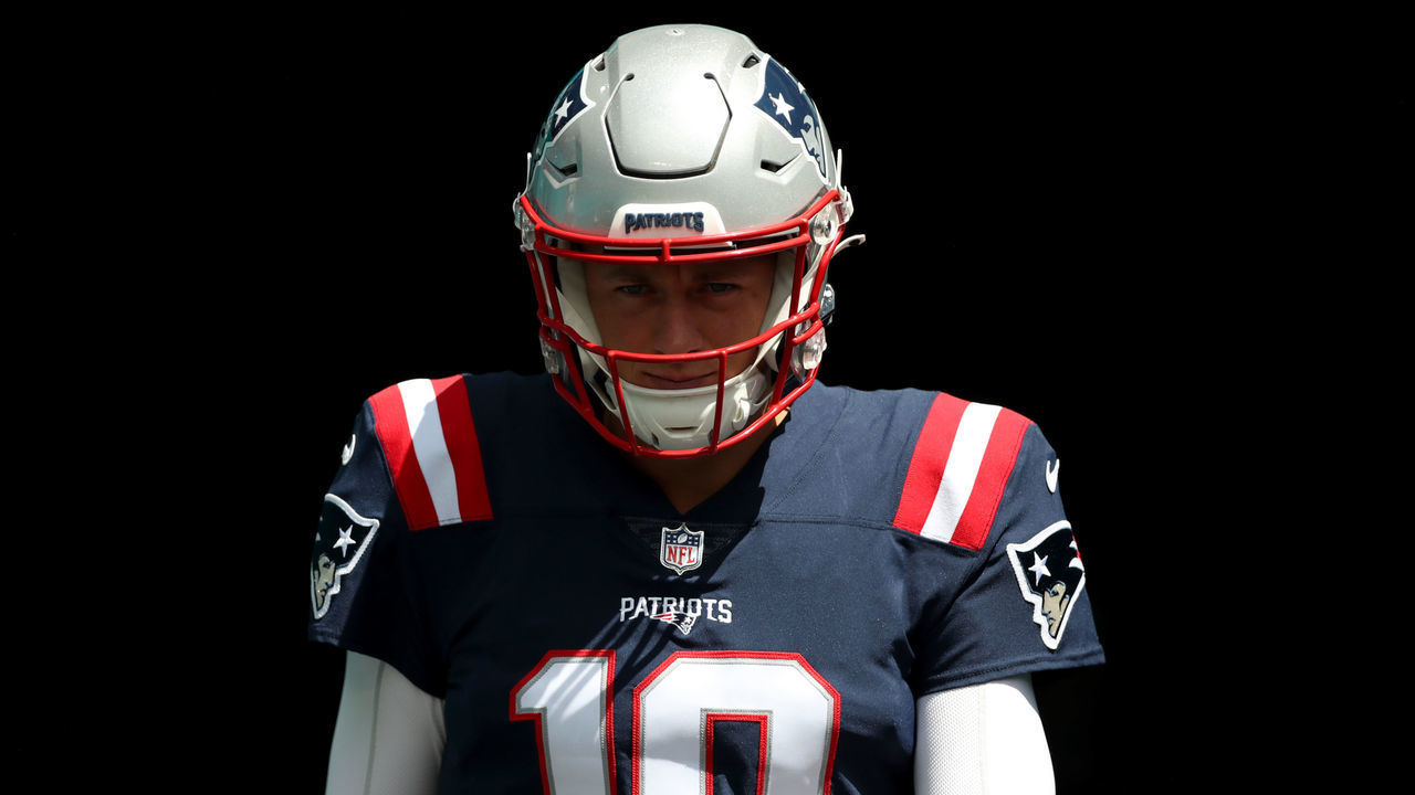 MIAMI GARDENS, FLORIDA - SEPTEMBER 11: Mac Jones #10 of the New England Patriots takes the field before the game against the Miami Dolphins at Hard Rock Stadium on September 11, 2022 in Miami Gardens, Florida.