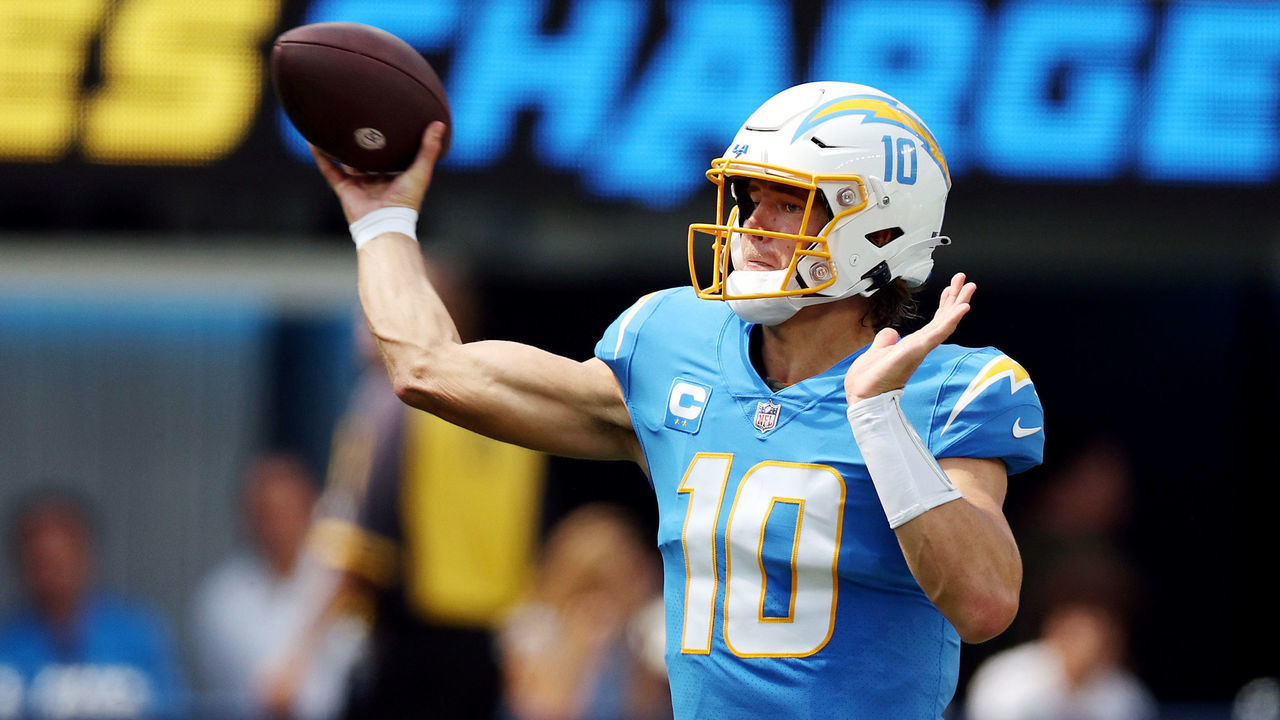 INGLEWOOD, CALIFORNIA - SEPTEMBER 11: Quarterback Justin Herbert #10 of the Los Angeles Chargers attempts a pass during the first half against the Las Vegas Raiders at SoFi Stadium on September 11, 2022 in Inglewood, California.