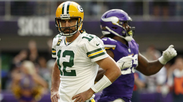 MINNEAPOLIS, MINNESOTA - SEPTEMBER 11: Aaron Rodgers #12 of the Green Bay Packers looks on during the second quarter in the game against the Minnesota Vikings at U.S. Bank Stadium on September 11, 2022 in Minneapolis, Minnesota.