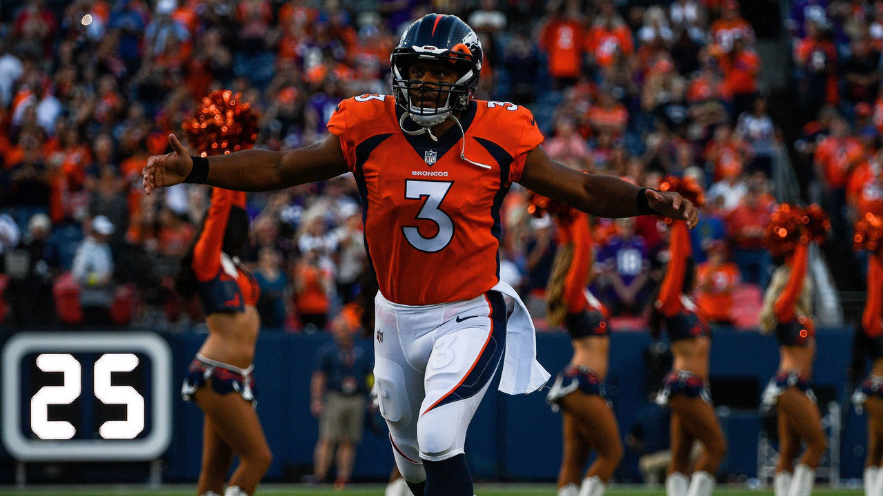 DENVER, COLORADO - AUGUST 27: Quarterback Russell Wilson #3 of the Denver Broncos runs onto the field before a preseason NFL game against the Minnesota Vikings at Empower Field at Mile High on August 27, 2022 in Denver, Colorado.