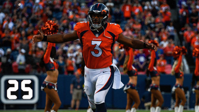 DENVER, COLORADO - AUGUST 27: Quarterback Russell Wilson #3 of the Denver Broncos runs onto the field before a preseason NFL game against the Minnesota Vikings at Empower Field at Mile High on August 27, 2022 in Denver, Colorado.