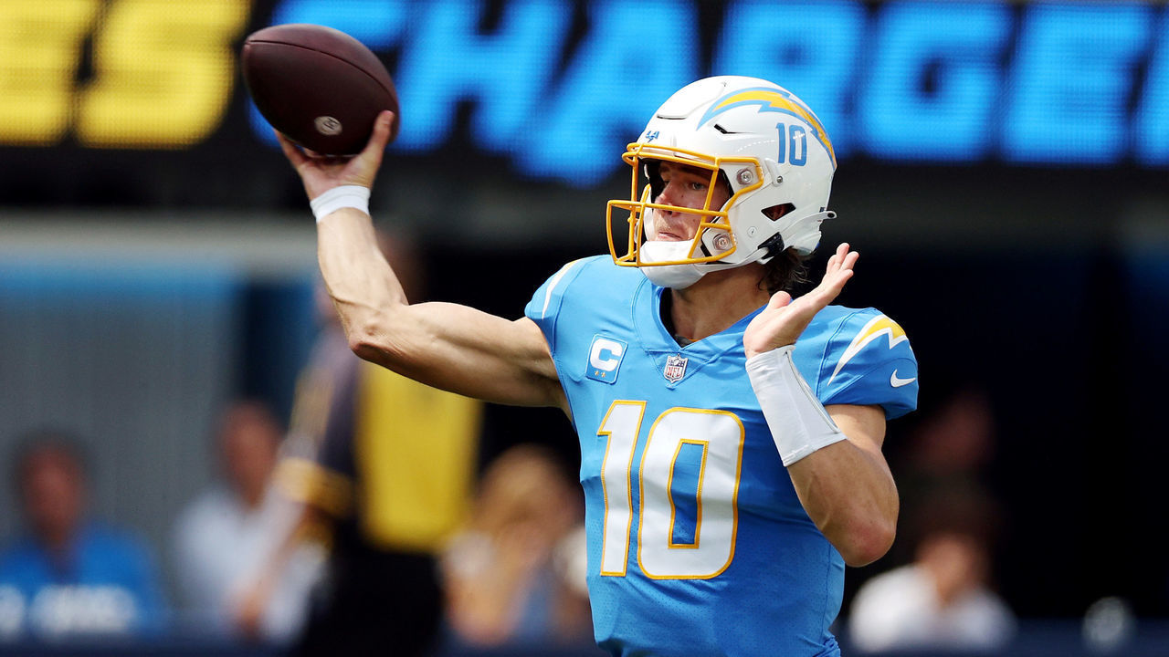 INGLEWOOD, CALIFORNIA - SEPTEMBER 11: Quarterback Justin Herbert #10 of the Los Angeles Chargers attempts a pass during the first half against the Las Vegas Raiders at SoFi Stadium on September 11, 2022 in Inglewood, California.