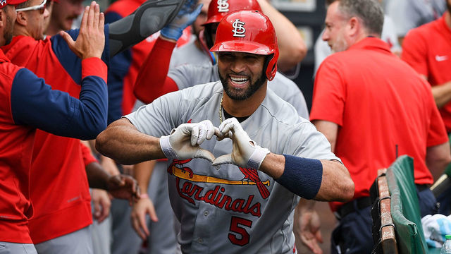 PITTSBURGH, PA - SEPTEMBER 11: Albert Pujols #5 of the St. Louis Cardinals reacts in the dugout after hitting a two-run home run in the ninth inning during the game against the Pittsburgh Pirates at PNC Park on September 11, 2022 in Pittsburgh, Pennsylvania. The home run was the 697th of Pujols career, moving him to 4th place all time in MLB home runs.