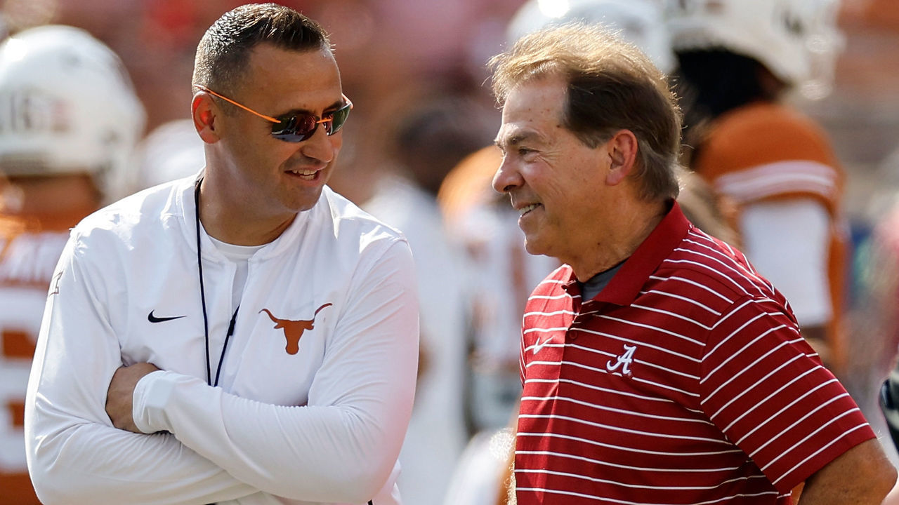 AUSTIN, TEXAS - SEPTEMBER 10: Head coach Steve Sarkisian of the Texas Longhorns talks with head coach Nick Saban of the Alabama Crimson Tide before the game at Darrell K Royal-Texas Memorial Stadium on September 10, 2022 in Austin, Texas.