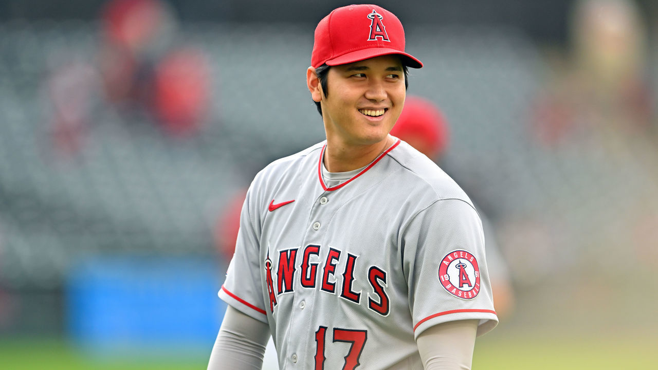 CLEVELAND, OHIO - SEPTEMBER 13: Shohei Ohtani #17 of the Los Angeles Angels jokes with a teammate prior to the game against the Cleveland Guardians at Progressive Field on September 13, 2022 in Cleveland, Ohio.