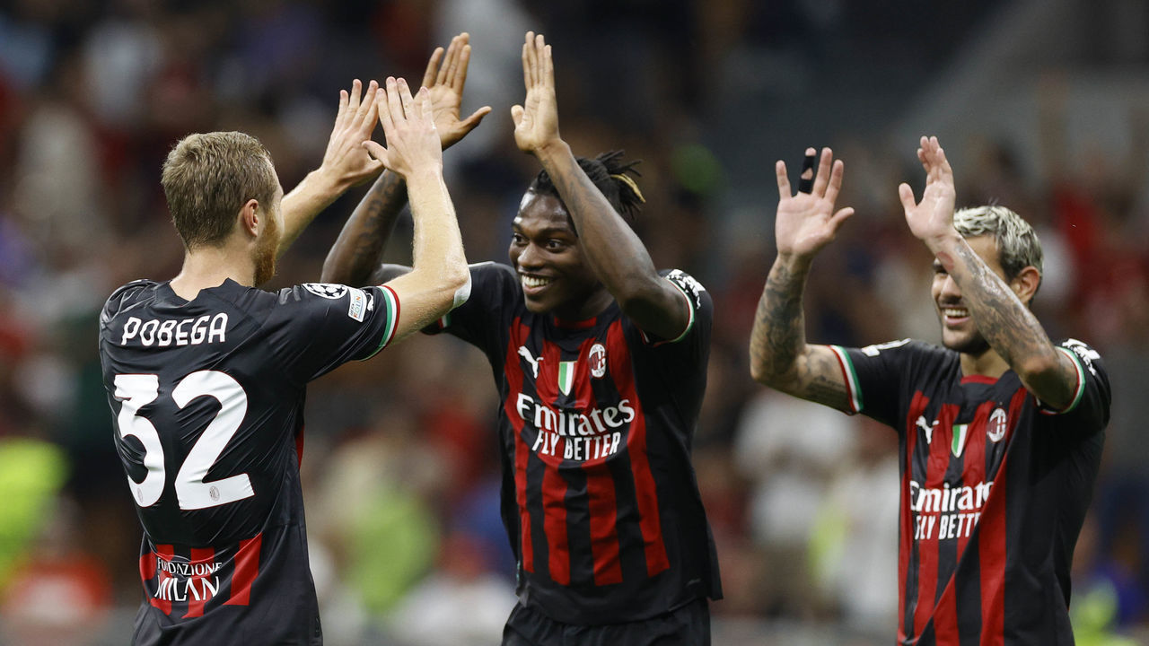 MILAN, ITALY - SEPTEMBER 14: Tommaso Pobega of AC Milan celebrates after scoring his team's third goal with team mates during the UEFA Champions League group E match between AC Milan and Dinamo Zagreb at Giuseppe Meazza Stadium on September 14, 2022 in Milan, Italy.