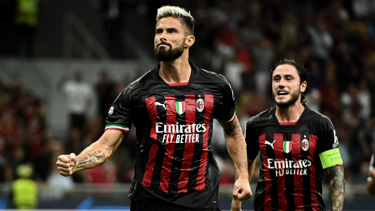 MILAN, ITALY - SEPTEMBER 14: Olivier Giroud of AC Milan celebrates after scoring a penalty goal during the UEFA Champions League match AC Milan vs Dinamo Zagreb at San Siro Stadium in Milan, Italy on 14 September 22