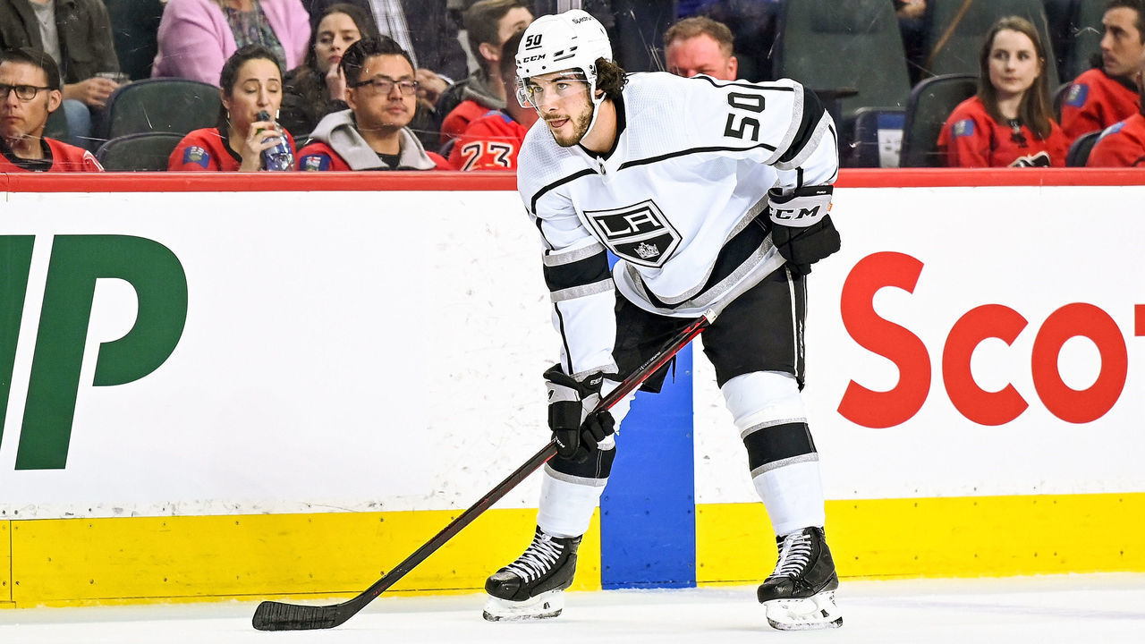 CALGARY, AB - MARCH 31: Los Angeles Kings Defenceman Sean Durzi (50) gets set for a face-off during the first period of an NHL game where the Calgary Flames hosted the Los Angeles Kings on March 31, 2022, at the Scotiabank Saddledome in Calgary, AB.