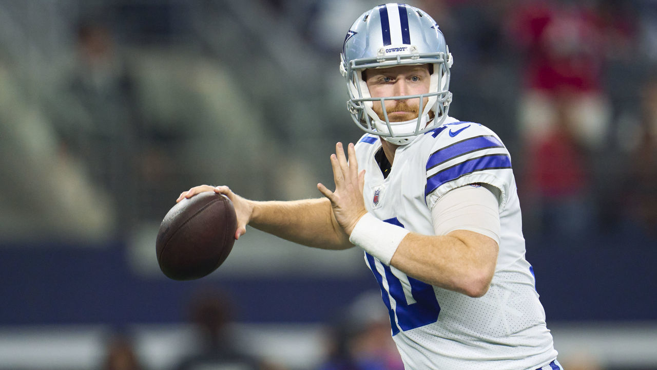 ARLINGTON, TX - SEPTEMBER 11: Cooper Rush #10 of the Dallas Cowboys drops back to pass against the Tampa Bay Buccaneers at AT&T Stadium on September 11, 2022 in Arlington, TX.