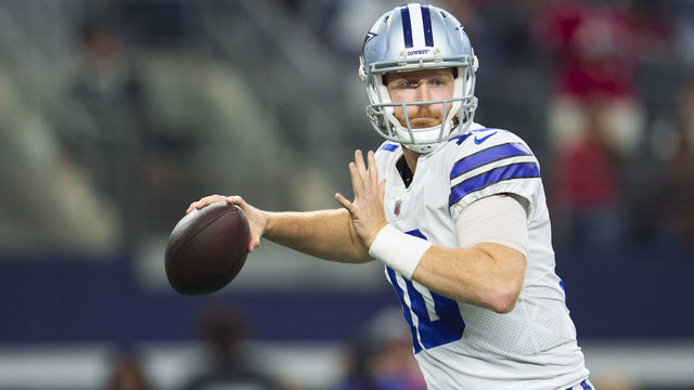 ARLINGTON, TX - SEPTEMBER 11: Cooper Rush #10 of the Dallas Cowboys drops back to pass against the Tampa Bay Buccaneers at AT&T Stadium on September 11, 2022 in Arlington, TX.