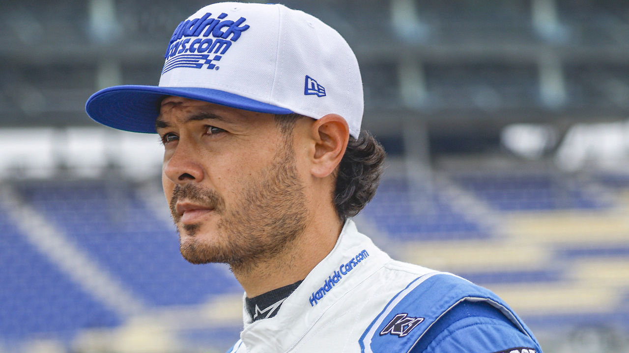 KANSAS CITY, KANSAS - SEPTEMBER 10: Kyle Larson, driver of the #5 HendrickCars.com Chevrolet, walks the grid during practice for the NASCAR Cup Series Hollywood Casino 400 at Kansas Speedway on September 10, 2022 in Kansas City, Kansas.