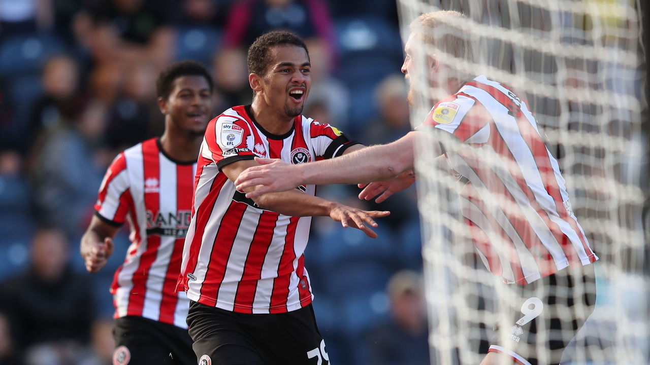 Sheffield United's Iliman Ndiaye (centre) celebrates scoring their side's first goal of the game during the Sky Bet Championship match at Deepdale Stadium, Preston. Picture date: Saturday September 17, 2022.
