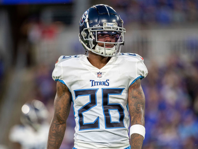 Tre Avery and Julius Chestnut of the Tennessee Titans walk off the News  Photo - Getty Images