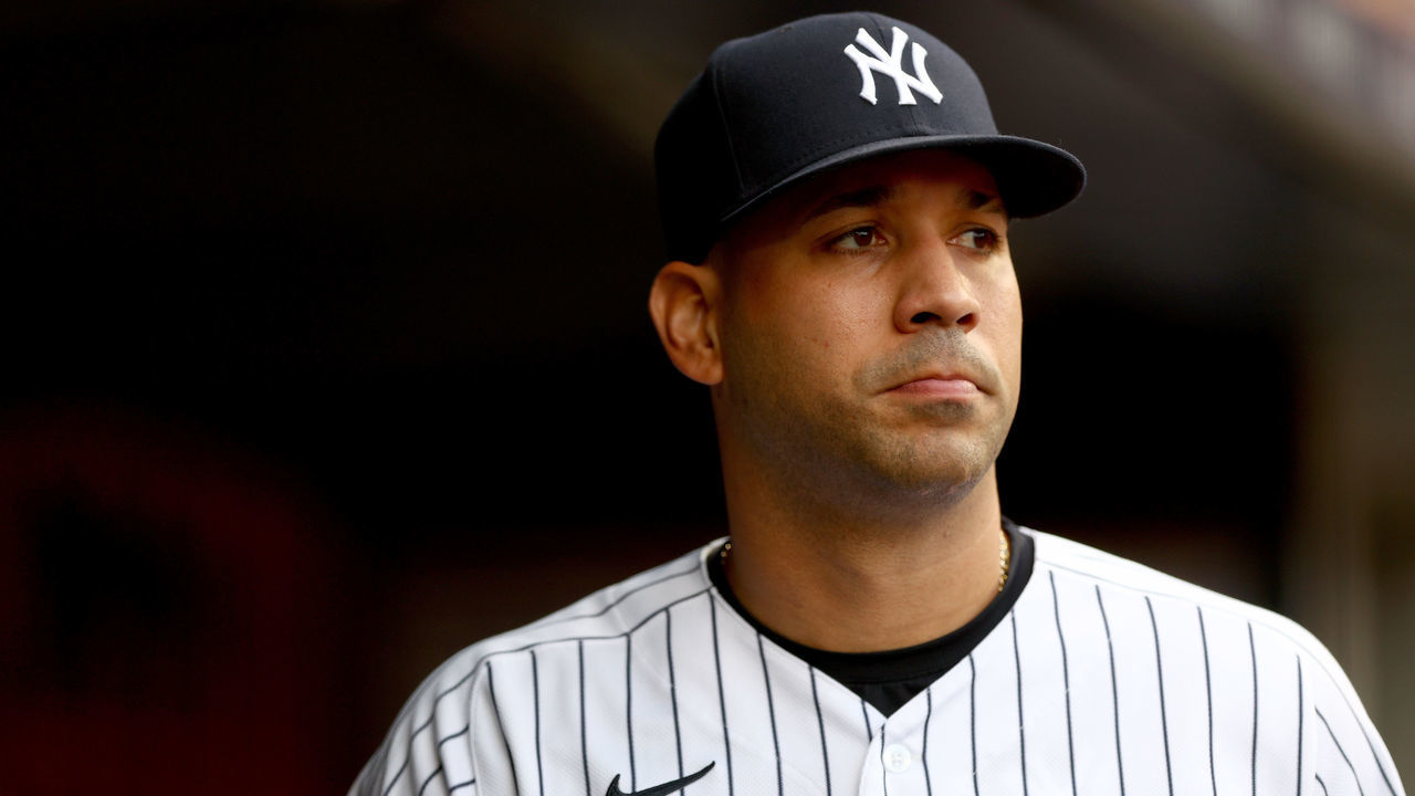 NEW YORK, NEW YORK - JULY 14: Marwin Gonzalez #14 of the New York Yankees walks out of the dugout before the game against the Cincinnati Reds at Yankee Stadium on July 14, 2022 in the Bronx borough of New York City.