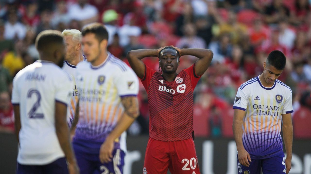 Ayo Akinola 2nd R of Toronto FC reacts after missing a shot during the 2022 Major League Soccer MLS match between Toronto FC and Orlando City SC at BMO Field in Toronto, Canada, on May 14, 2022.
