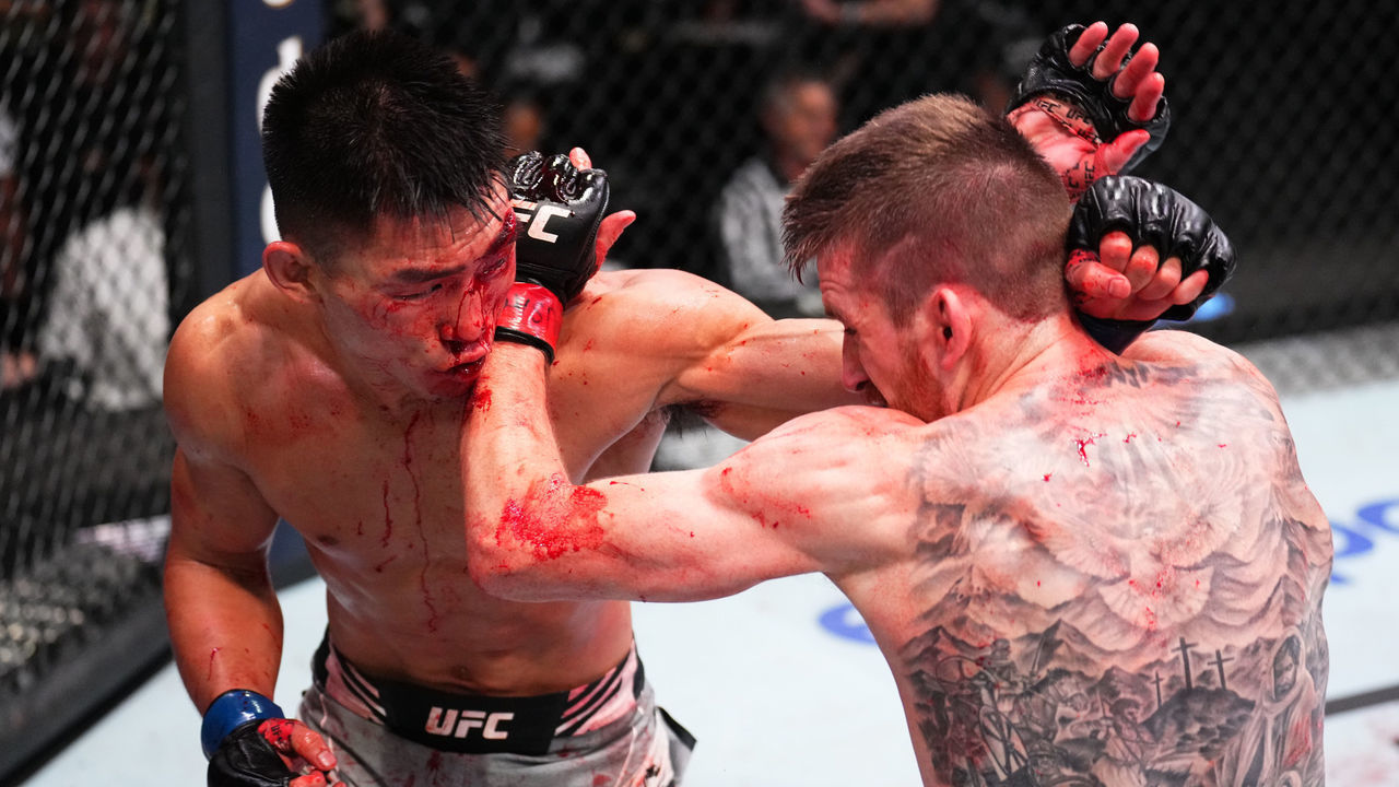 LAS VEGAS, NEVADA - SEPTEMBER 17: (L-R) Song Yadong of China punches Cory Sandhagen in a bantamweight fight during the UFC Fight Night event at UFC APEX on September 17, 2022 in Las Vegas, Nevada.