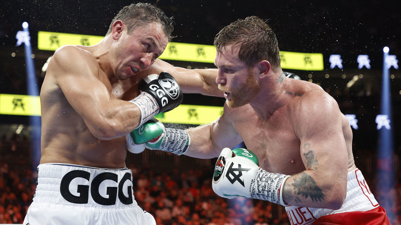 LAS VEGAS, NEVADA - SEPTEMBER 17: Canelo Alvarez (red trunks) and Gennadiy Golovkin (white trunks) exchange punches in the fight for the Super Middleweight Title at T-Mobile Arena on September 17, 2022 in Las Vegas, Nevada.