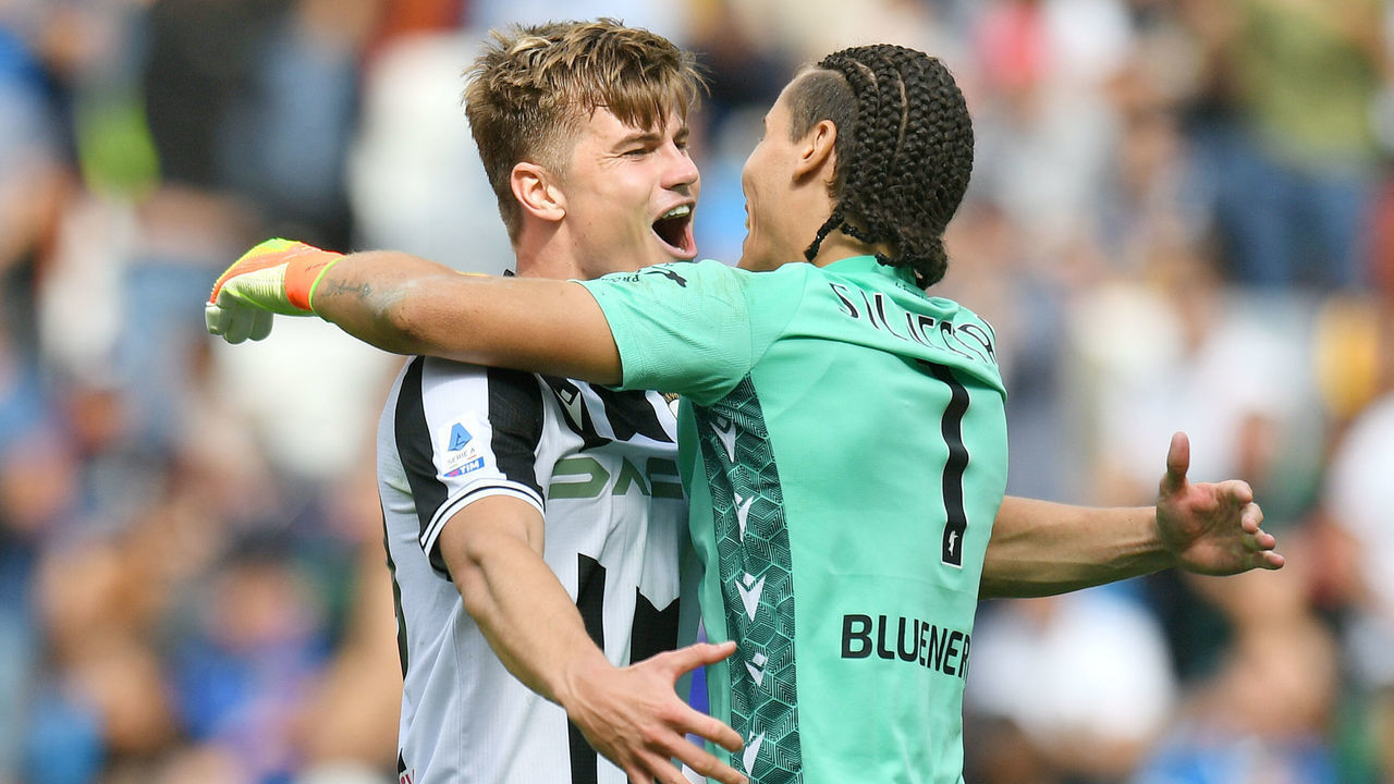 UDINE, ITALY - SEPTEMBER 18: Jaka Bijol of Udinese Calcio celebrates with teammate Marco Silvestri after victory in the Serie A match between Udinese Calcio and FC Internazionale at Dacia Arena on September 18, 2022 in Udine, Italy.
