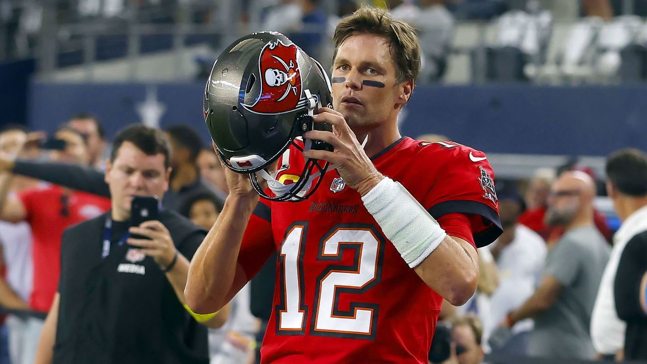 ARLINGTON, TX - SEPTEMBER 11: Tampa Bay Buccaneers Quarterback Tom Brady (12) puts on his helmet before the Tampa Bay Buccaneers-Dallas Cowboys regular season game on September 11, 2022 at AT&T Stadium in Arlington, TX.